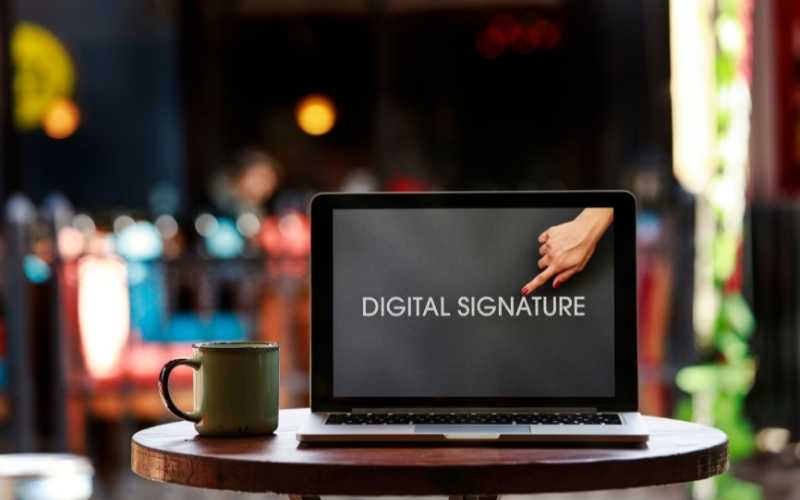 How do digital signatures work in Cybersecurity?